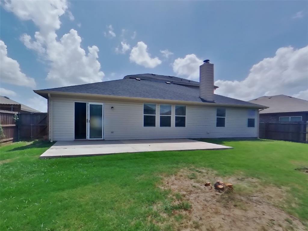 216 Rambling Way Forney, TX 75126 - Photo 20 of 22 a front view of a house with a garden and yard