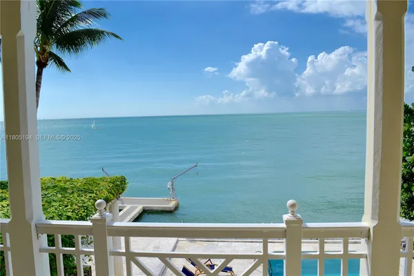 a view of a lake from a balcony