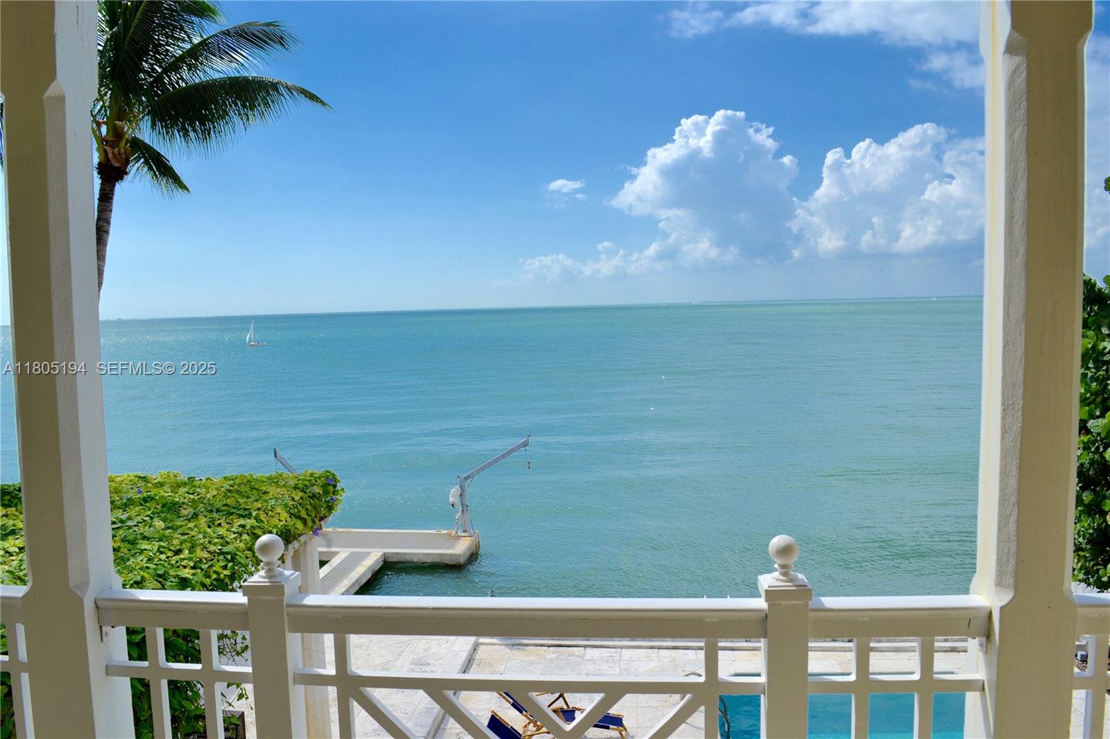 710 South Mashta Drive Key Biscayne, FL 33149 - Photo 12 of 13 a view of a lake from a balcony