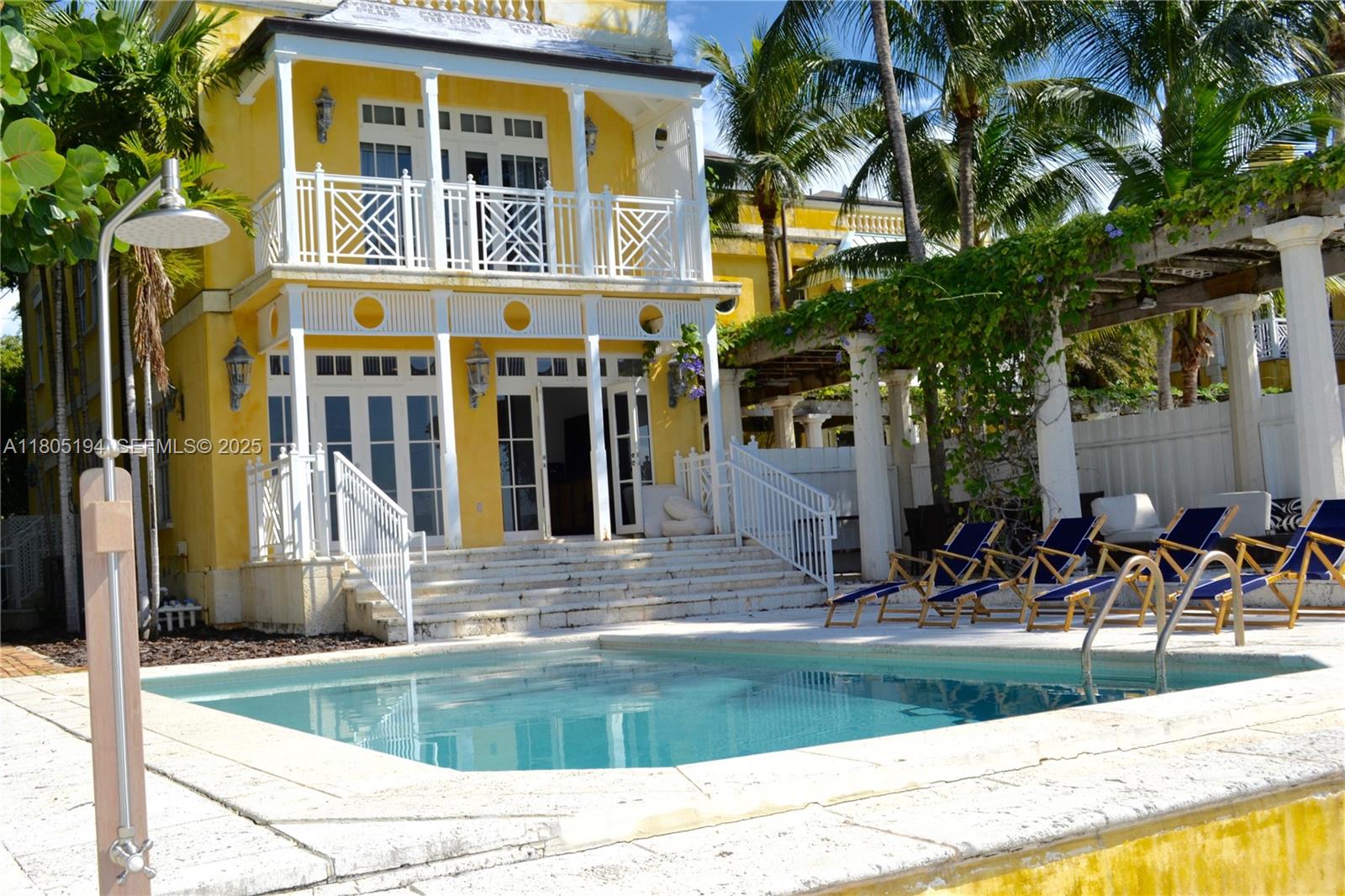 710 South Mashta Drive Key Biscayne, FL 33149 - Photo 13 of 13 a view of a building with a outdoor space