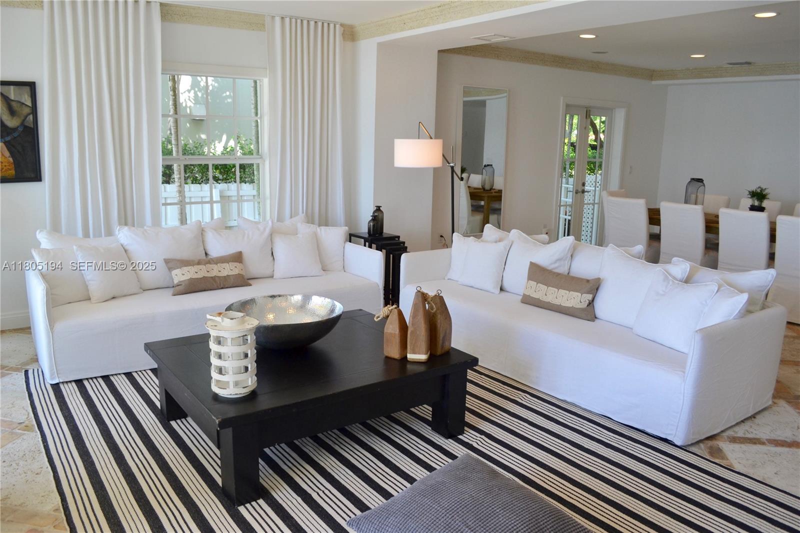 710 South Mashta Drive Key Biscayne, FL 33149 - Photo 2 of 13 a living room with furniture and wooden floor