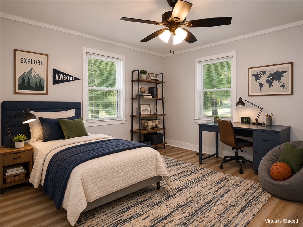 3517 Shawnee Avenue Anderson, SC 29626 - Photo 8 of 25 Comfortable bedroom features a ceiling fan, durable flooring, and ample natural light.