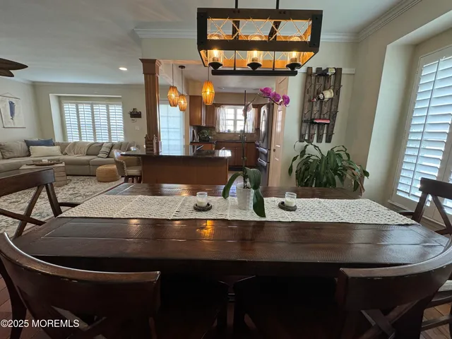 a view of a dining room with furniture