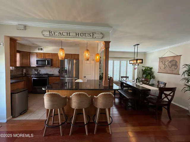 a view of a dining room with furniture