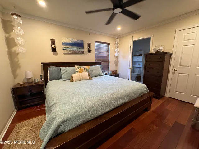 a bedroom with a bed and a walk in closet