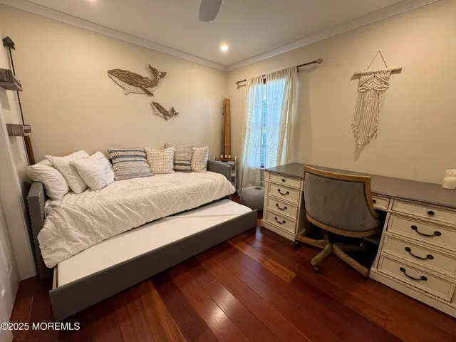 a bedroom with a bed and furniture