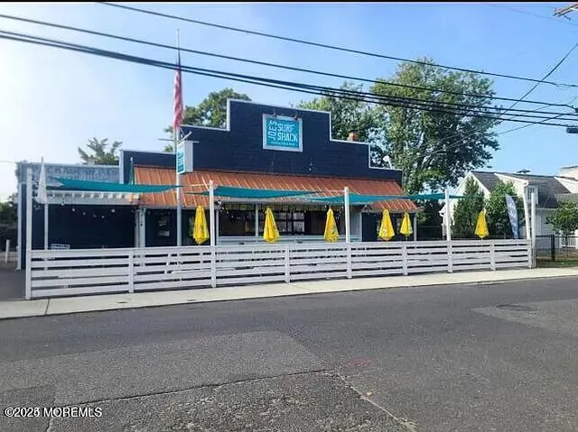 a view of a building with a street