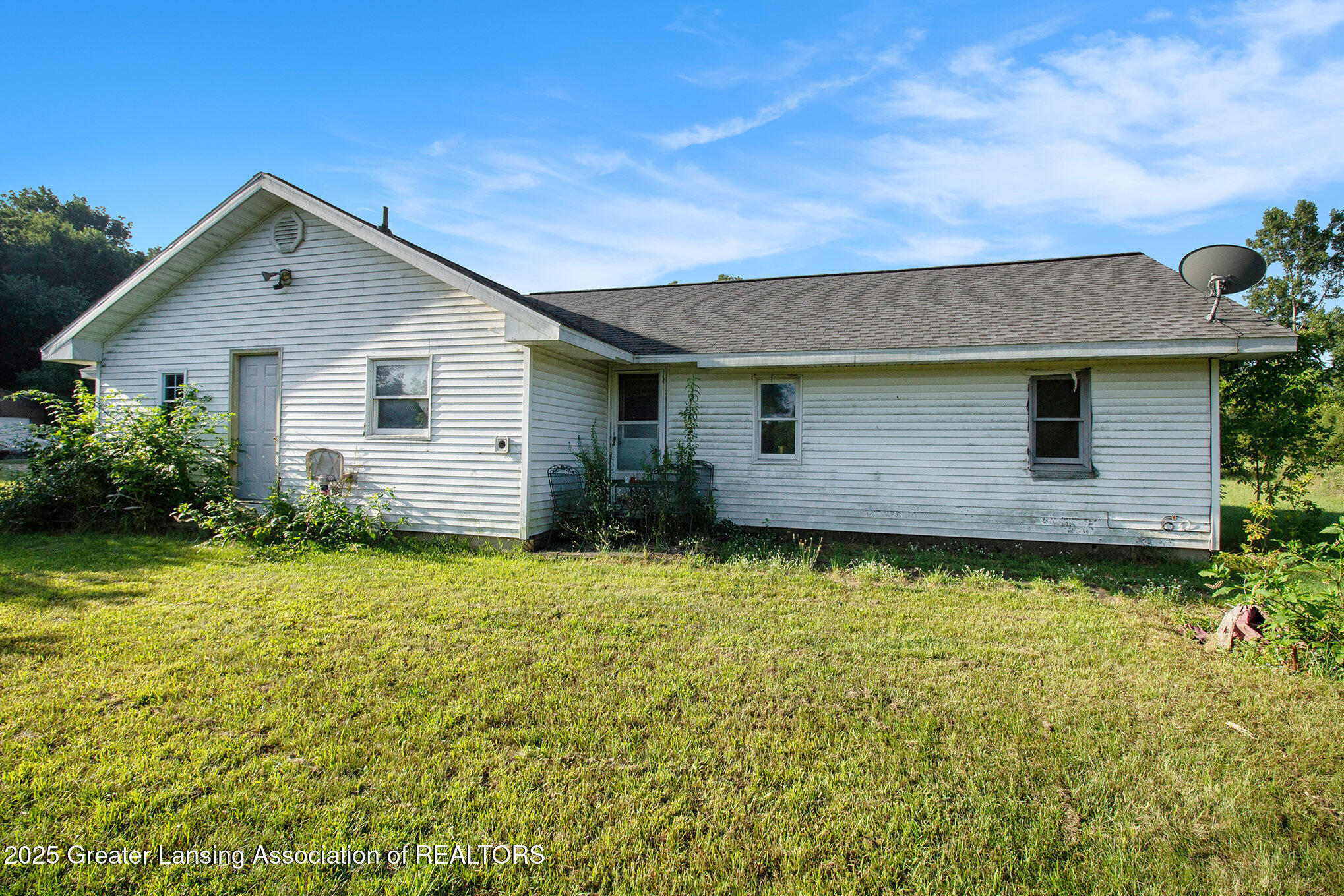 7910 Coon Hill Road Munith, MI 49259 - Photo 3 of 10 Back