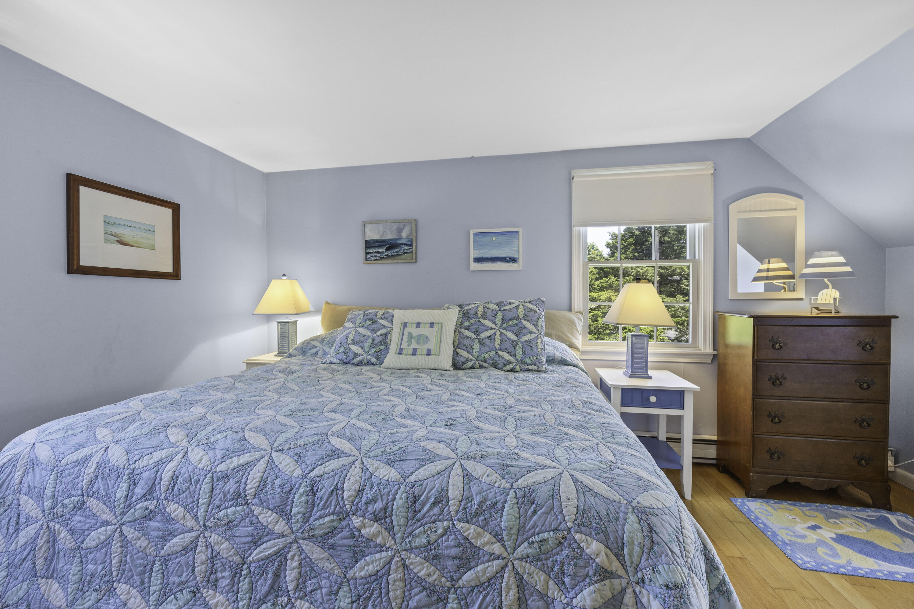 15 Doane Way Orleans, MA 02653 - Photo 18 of 54 a bedroom with a bed and a dresser