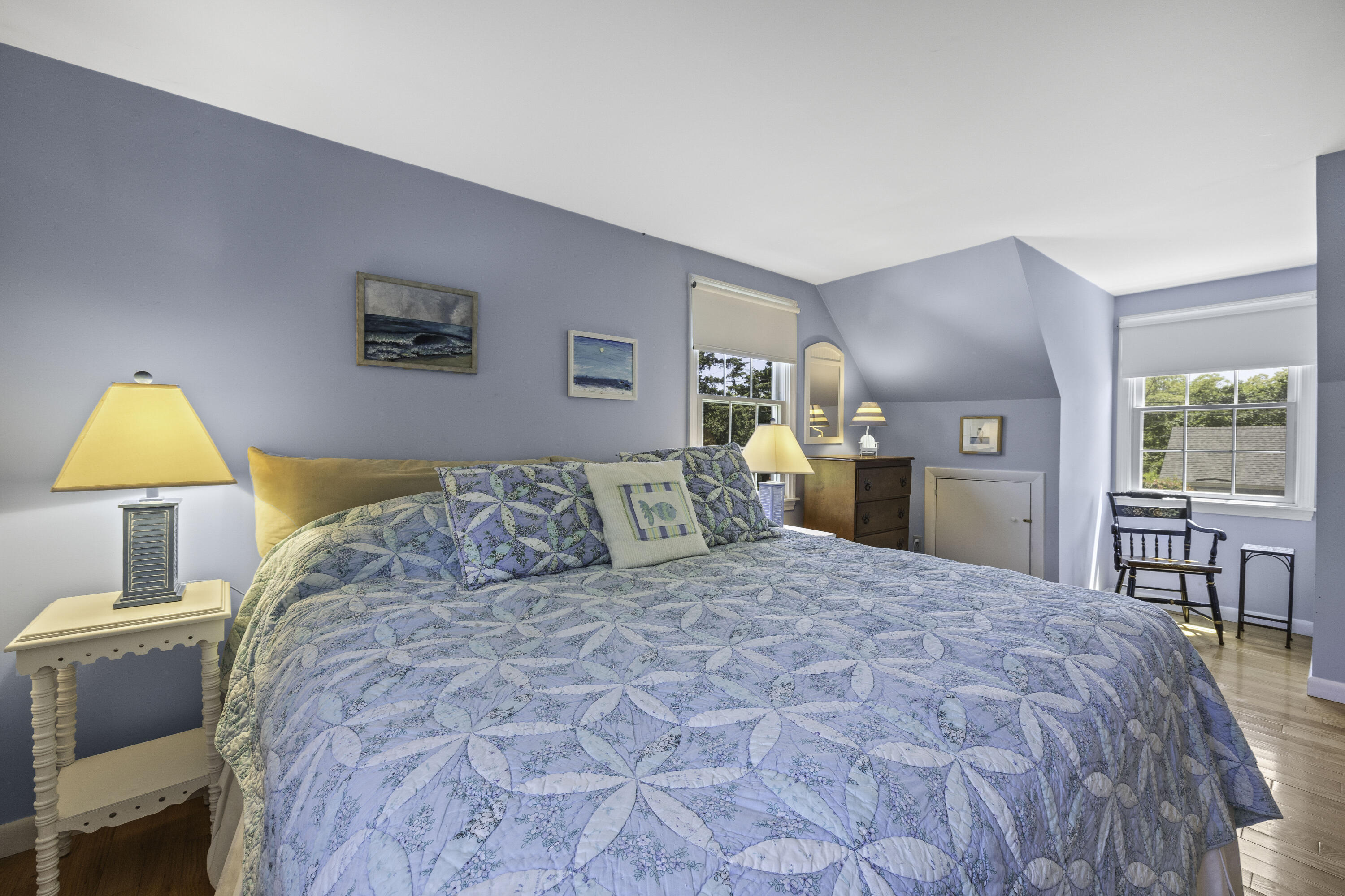 15 Doane Way Orleans, MA 02653 - Photo 19 of 54 a bedroom with a large bed and a dresser