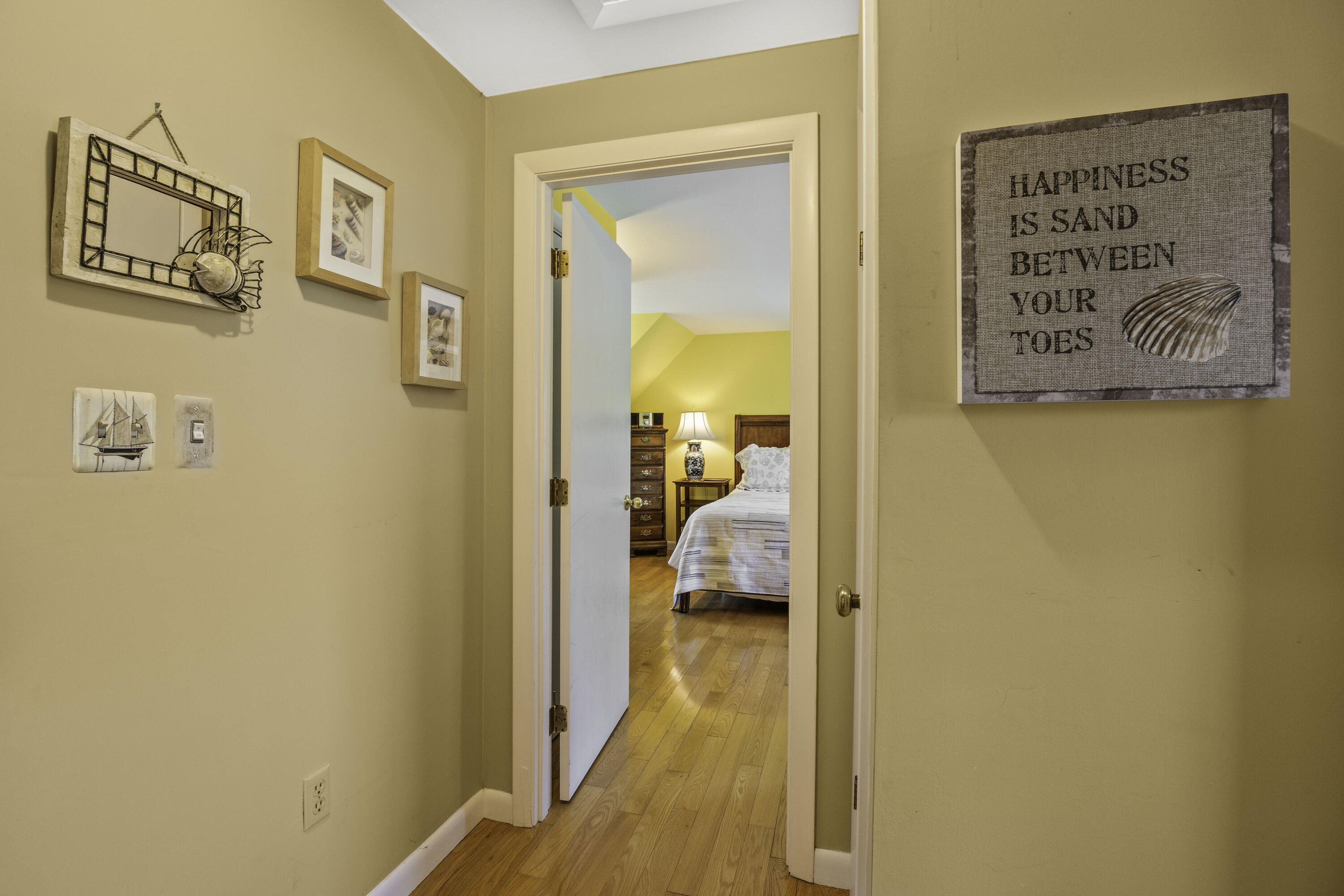 15 Doane Way Orleans, MA 02653 - Photo 20 of 54 a view of a bedroom from a hallway