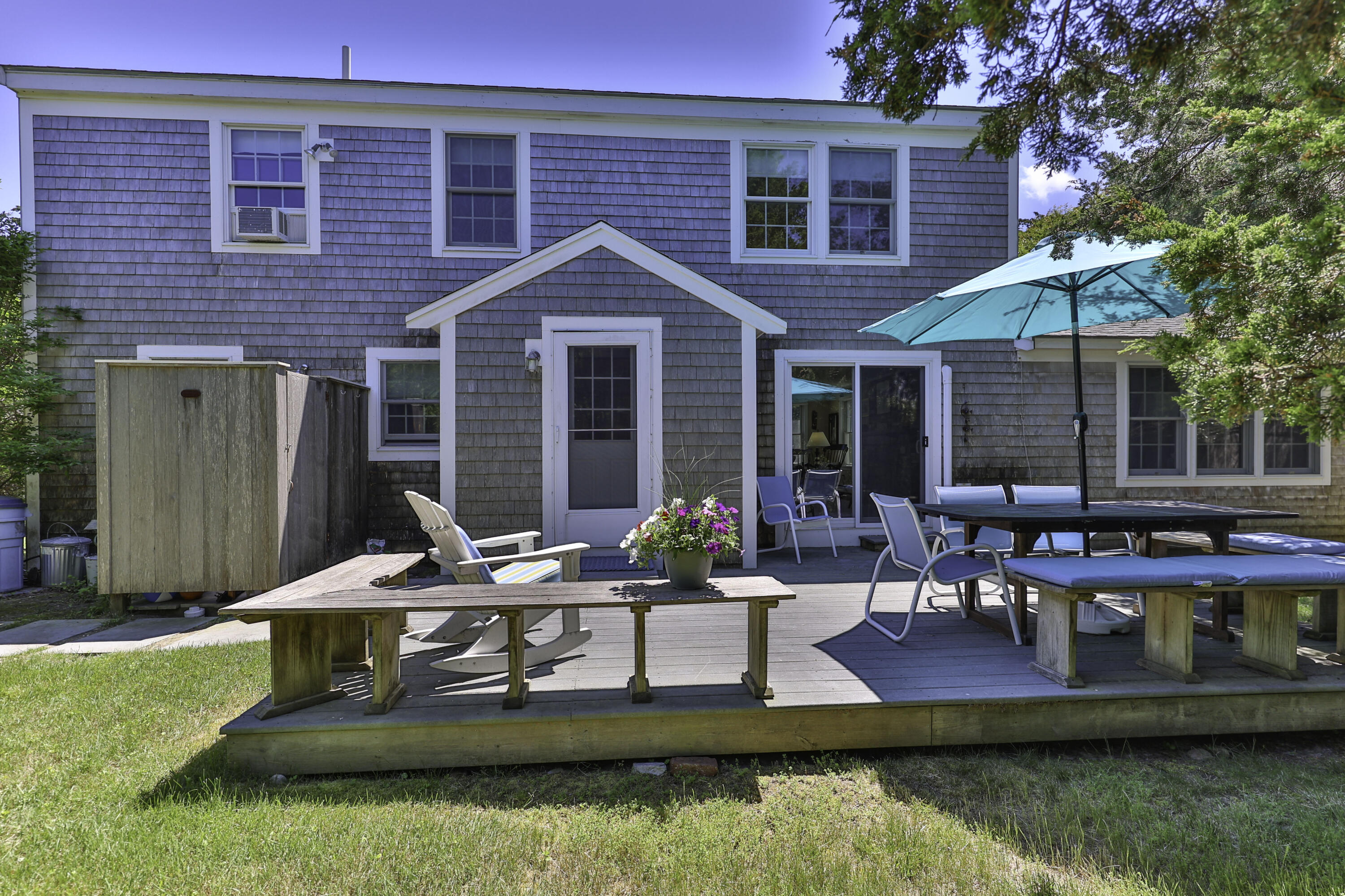 15 Doane Way Orleans, MA 02653 - Photo 29 of 54 a view of a house with swimming pool and furniture