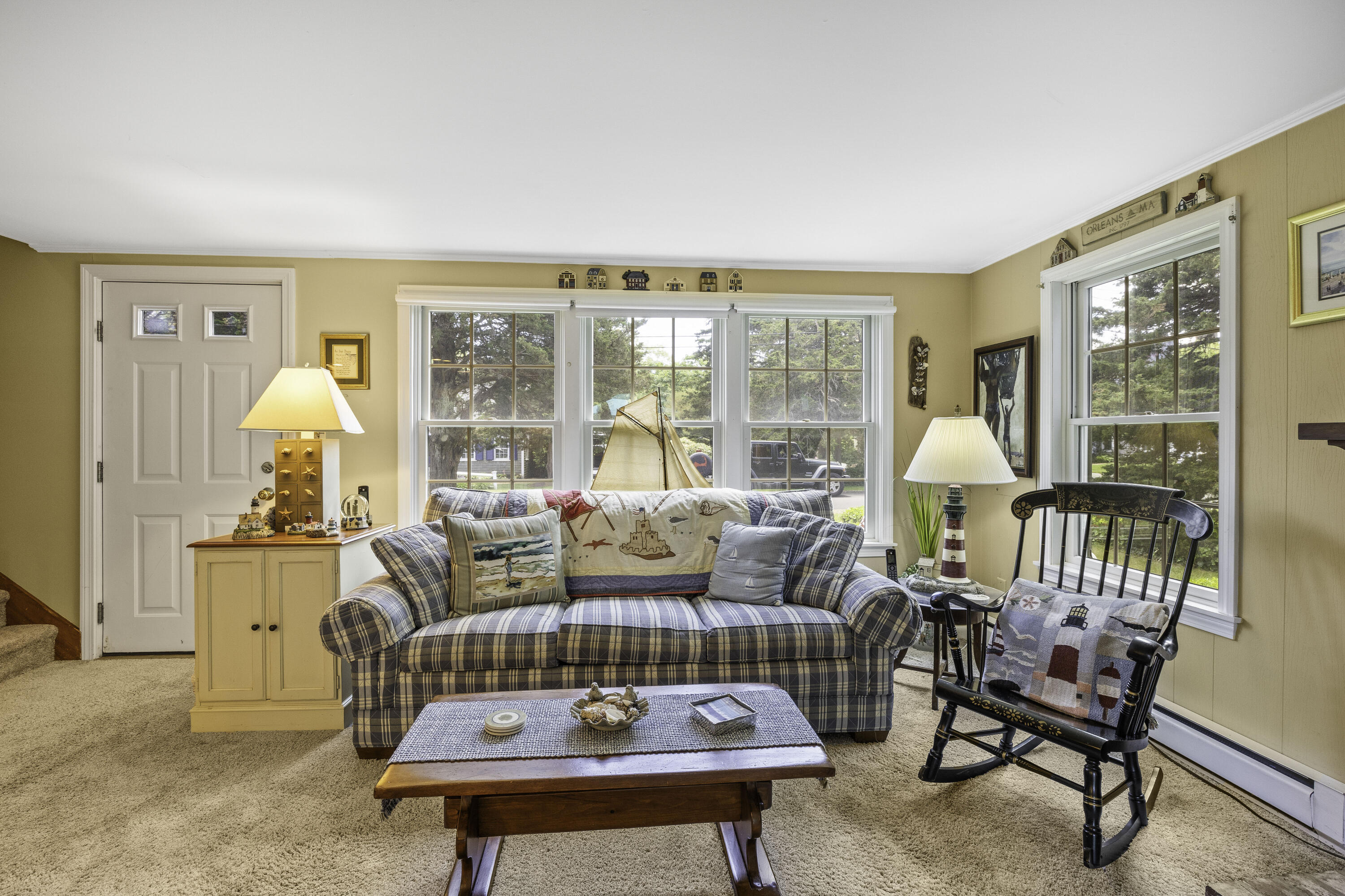 15 Doane Way Orleans, MA 02653 - Photo 4 of 54 a living room with furniture and a large window