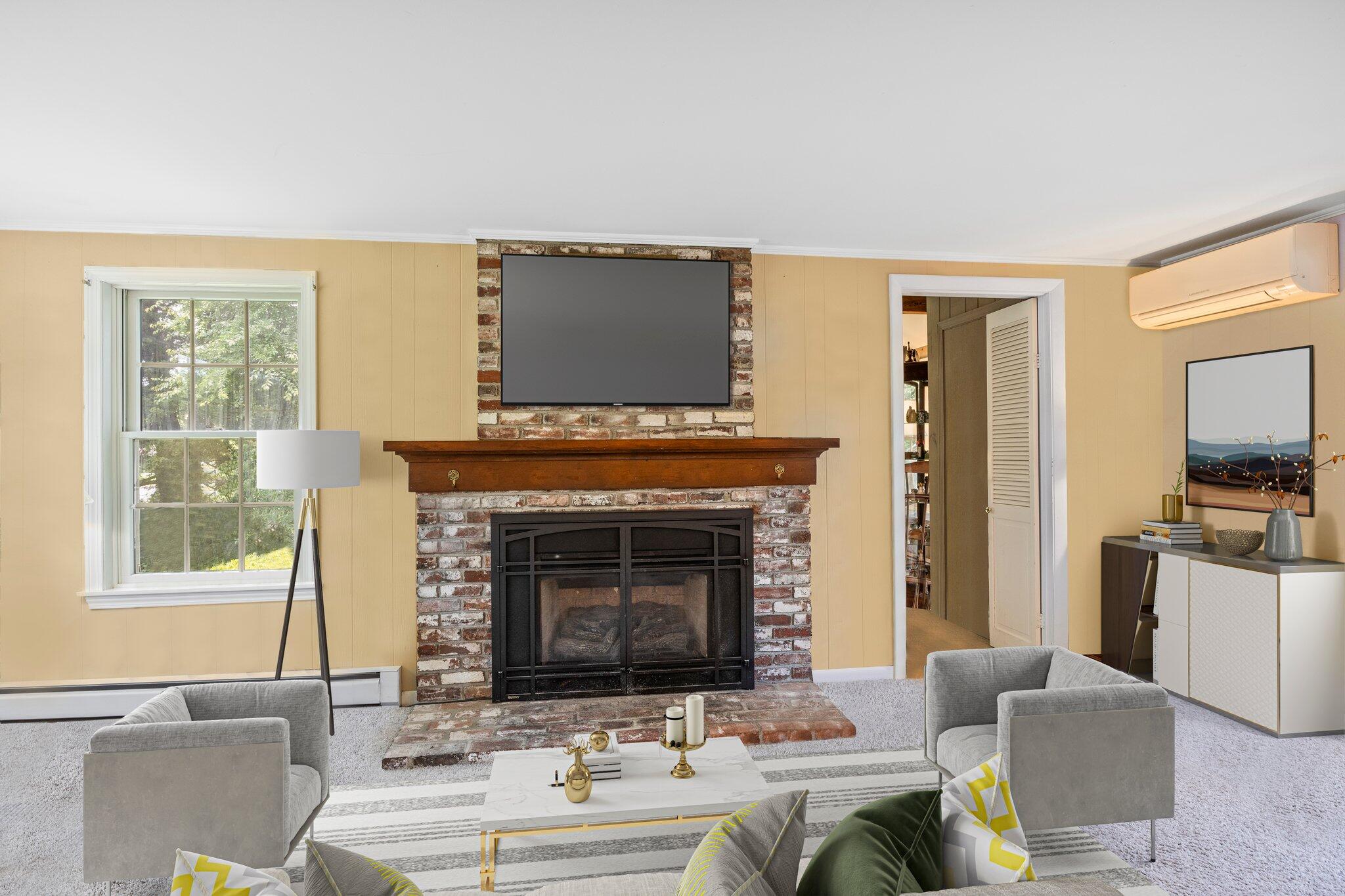 15 Doane Way Orleans, MA 02653 - Photo 6 of 54 a living room with furniture a fireplace and a flat screen tv