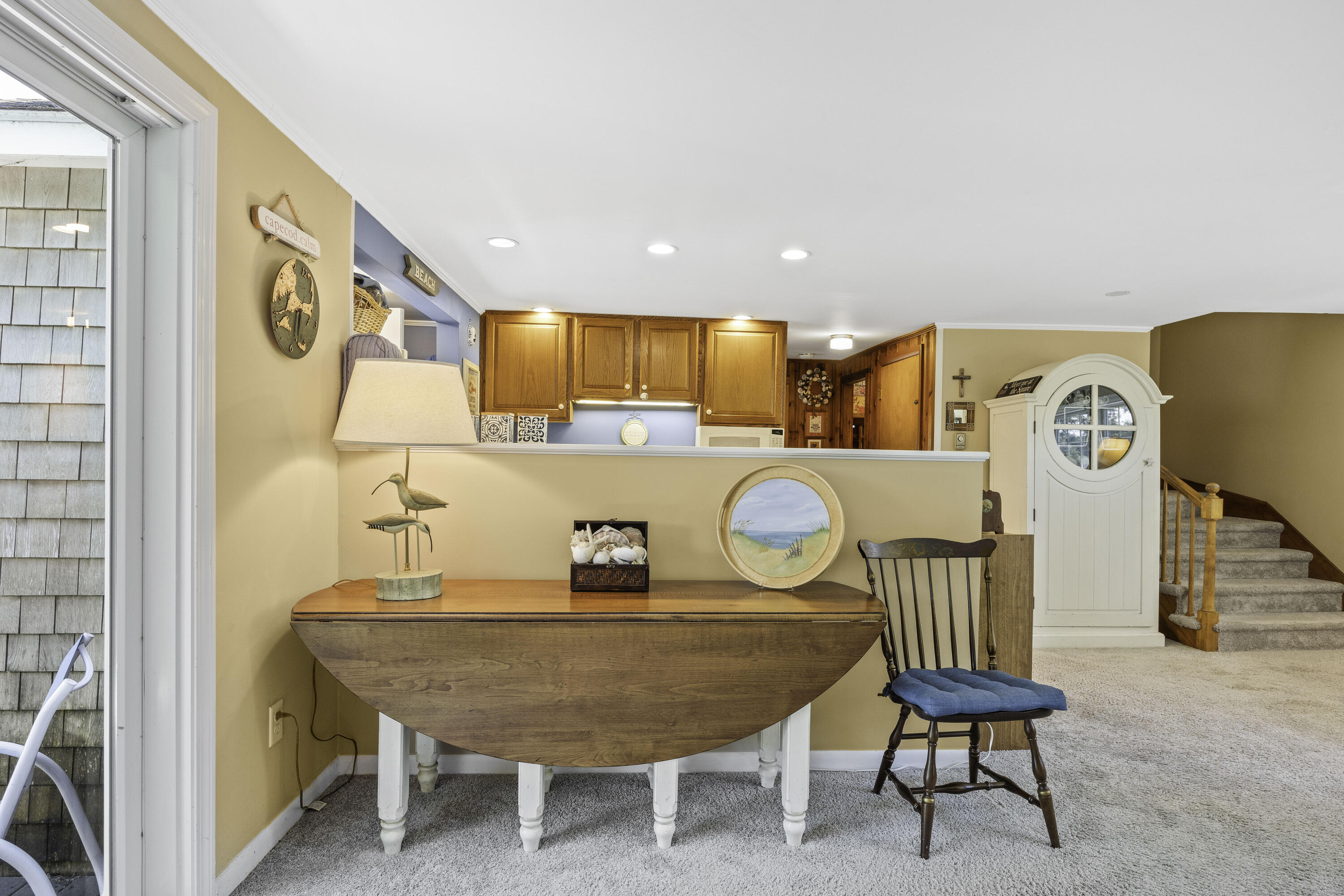15 Doane Way Orleans, MA 02653 - Photo 8 of 54 a dining room with furniture and wooden floor