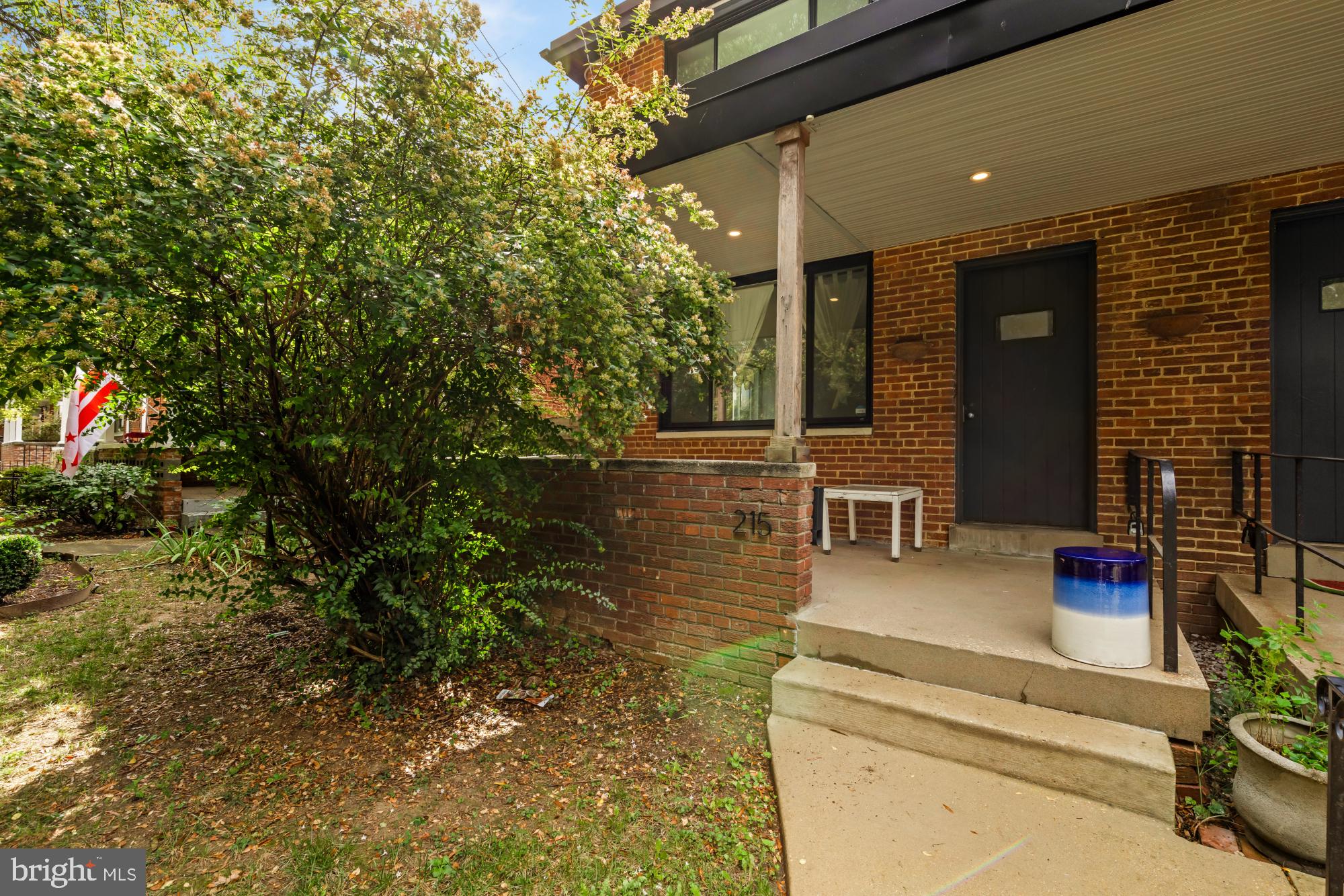 215 Hawaii Avenue Northeast Washington, DC 20011 - Photo 3 of 45 a lobby with furniture and garden