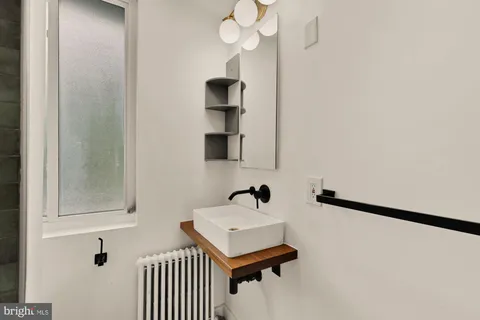 a bathroom with a bathtub