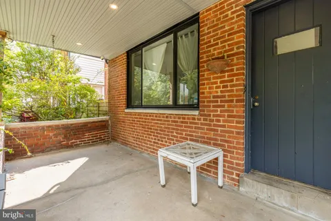 a view of house with yard