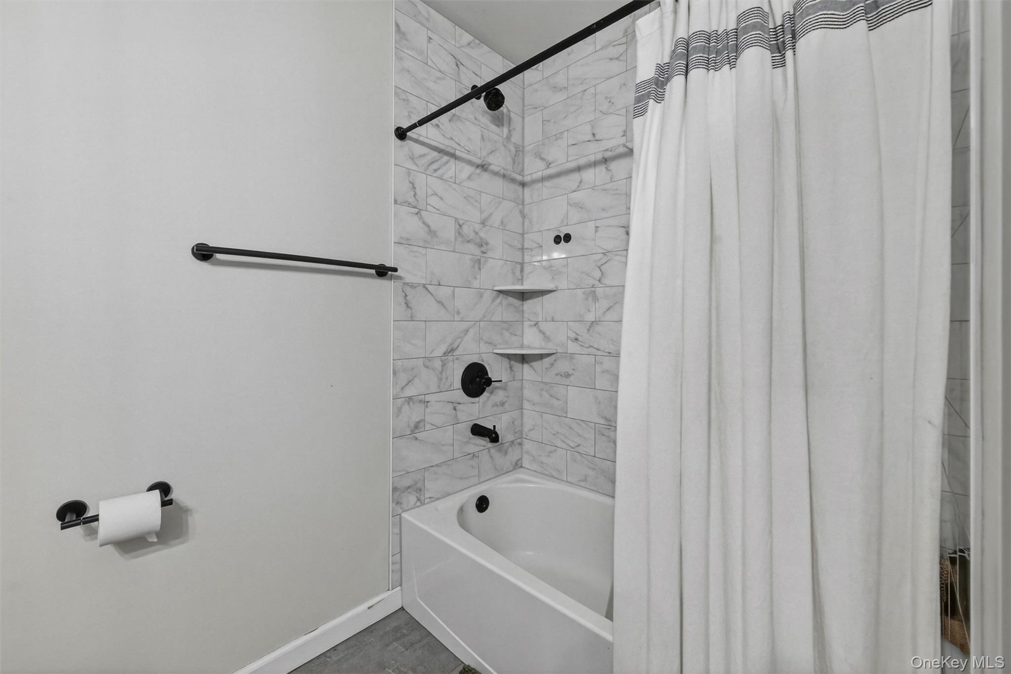 153 Ridge Drive Middletown, NY 10940 - Photo 24 of 47 a bathroom with a shower and a bathtub