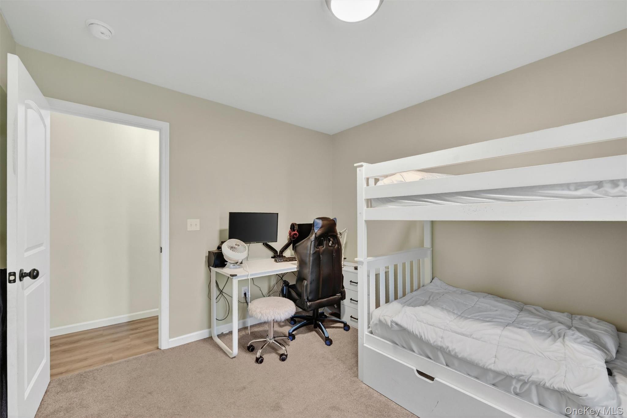 153 Ridge Drive Middletown, NY 10940 - Photo 32 of 47 a bedroom with a bed and a desk
