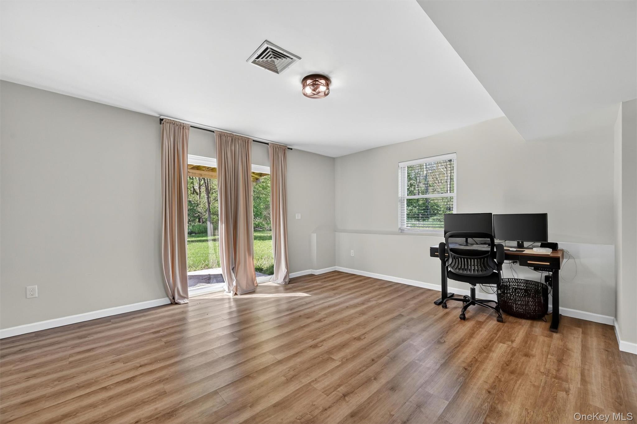 153 Ridge Drive Middletown, NY 10940 - Photo 38 of 47 a workspace with furniture hardwood and a window