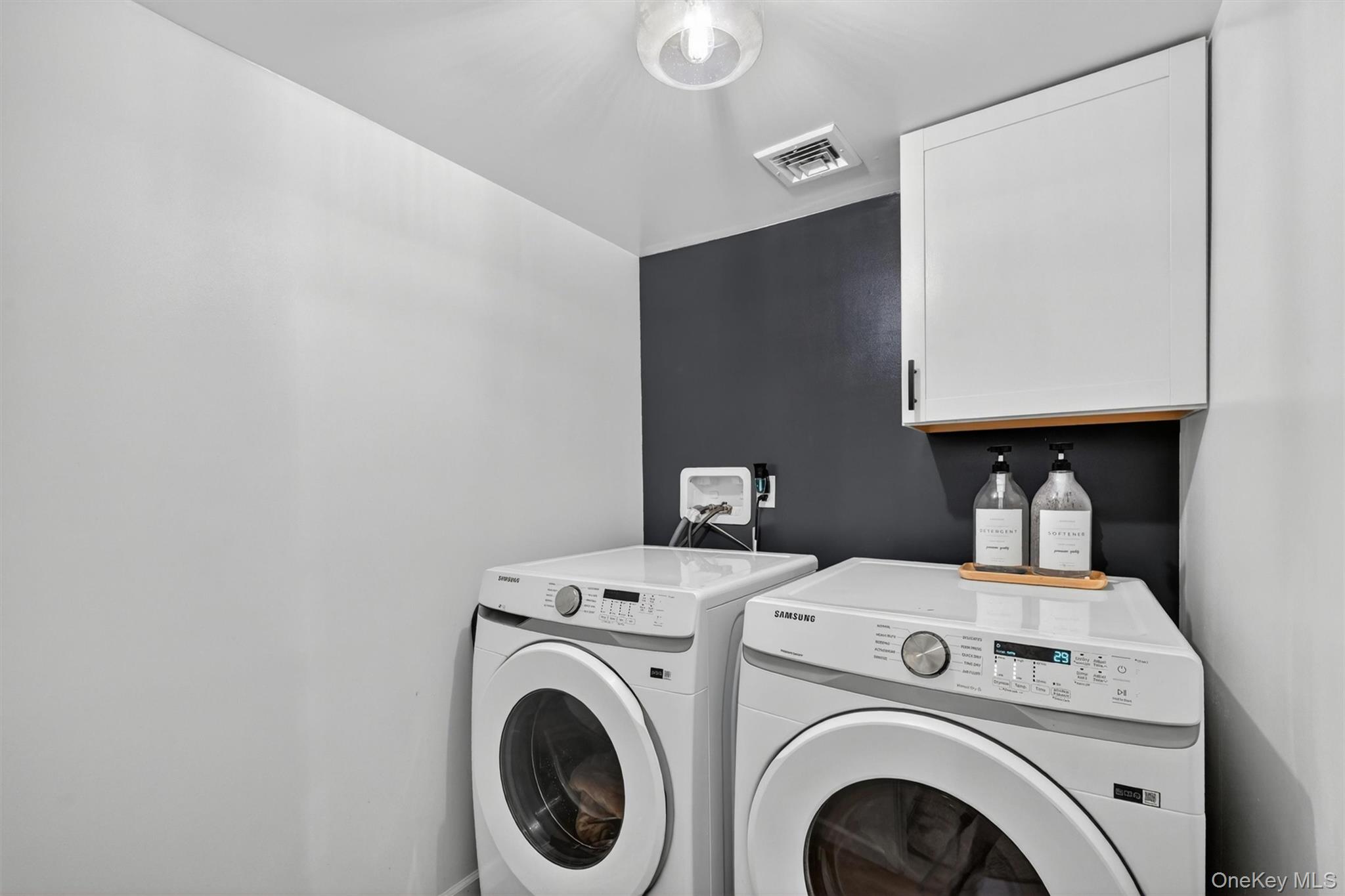 153 Ridge Drive Middletown, NY 10940 - Photo 41 of 47 a view of storage and utility room with washer and dryer