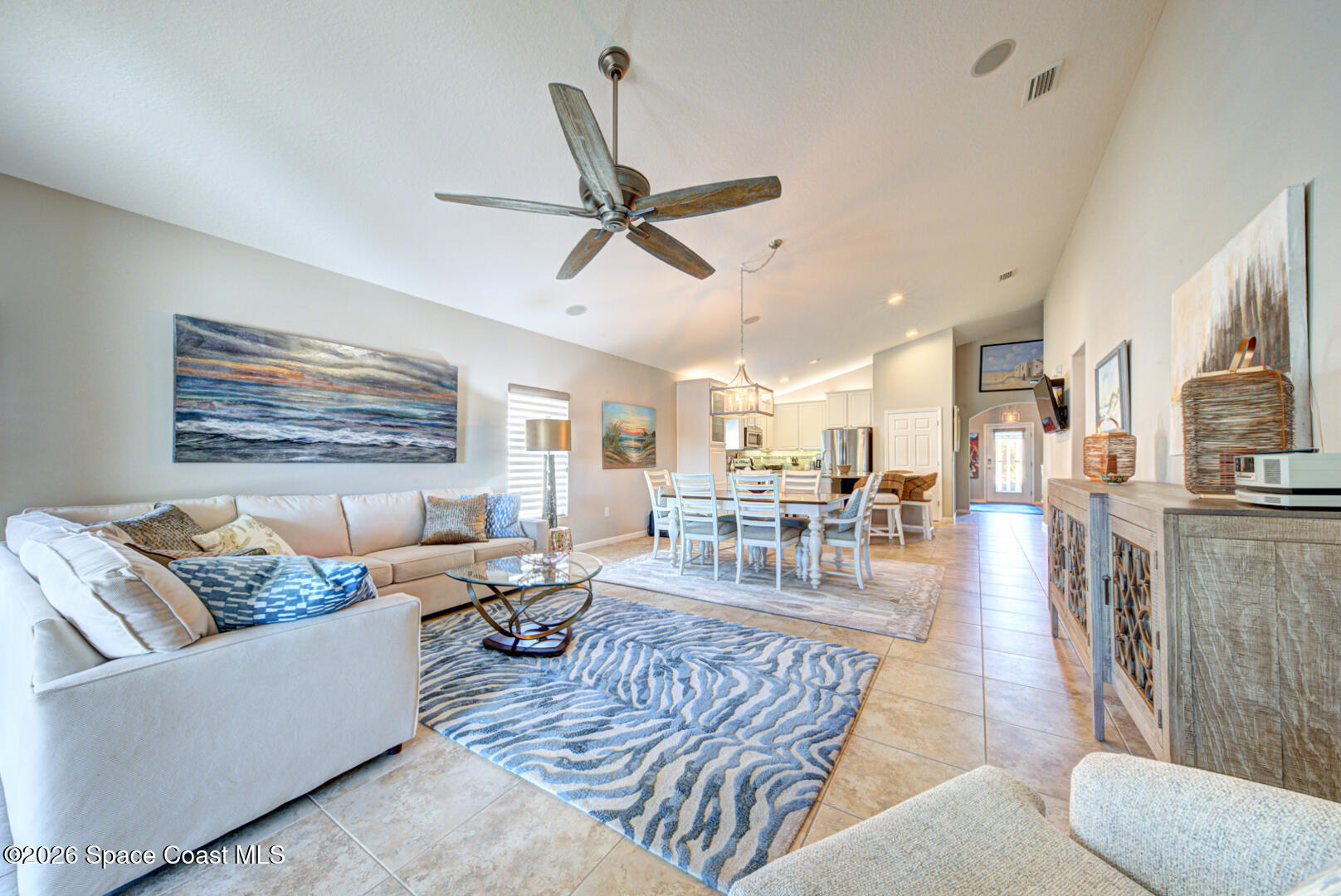 2975 Louetta Circle Melbourne, FL 32901 - Photo 15 of 44 a living room with furniture and a view of kitchen