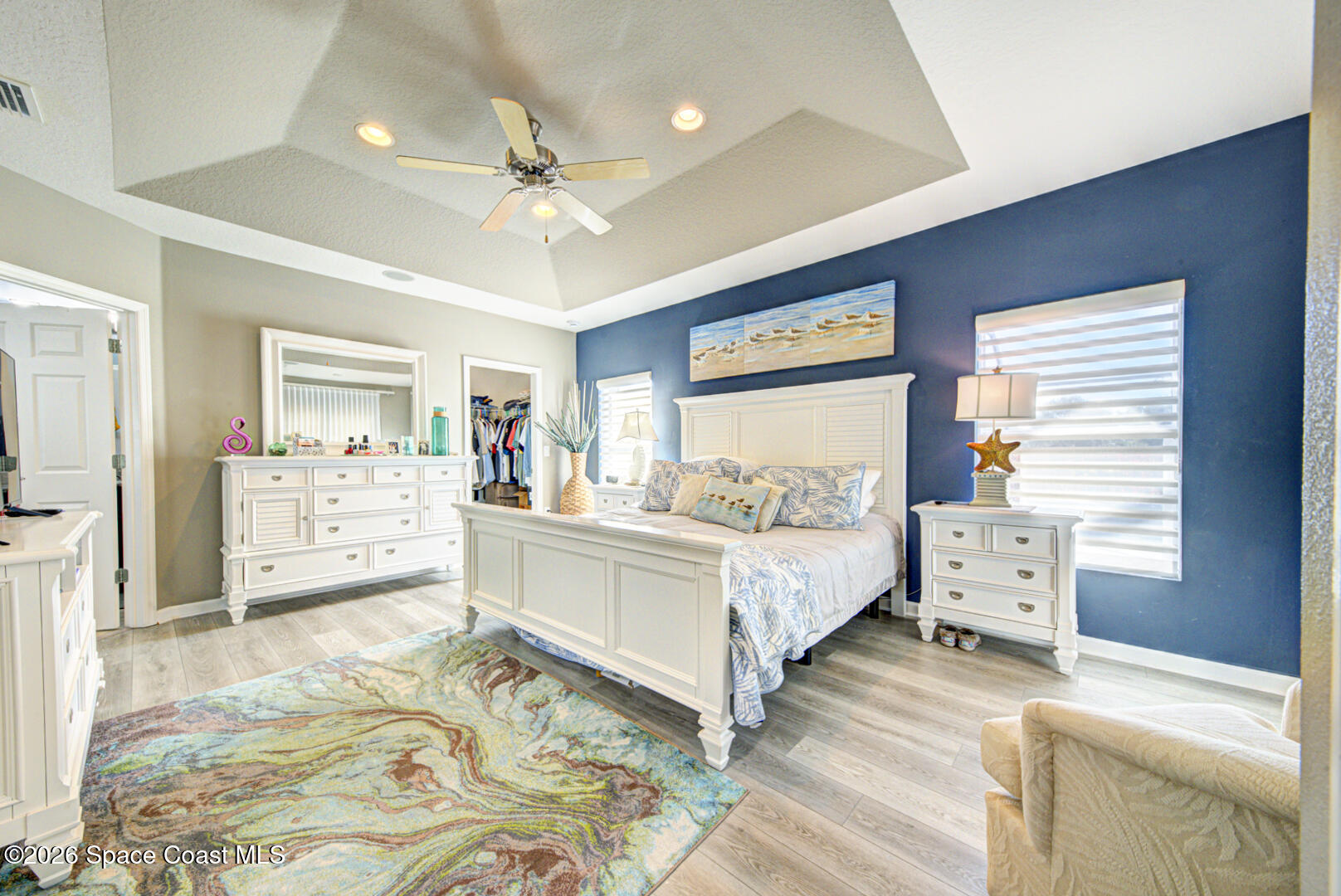 2975 Louetta Circle Melbourne, FL 32901 - Photo 16 of 44 a living room with furniture and a large window