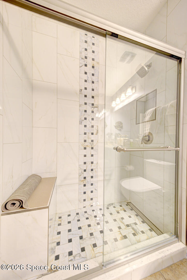 2975 Louetta Circle Melbourne, FL 32901 - Photo 27 of 44 a bathroom with a shower and a sink