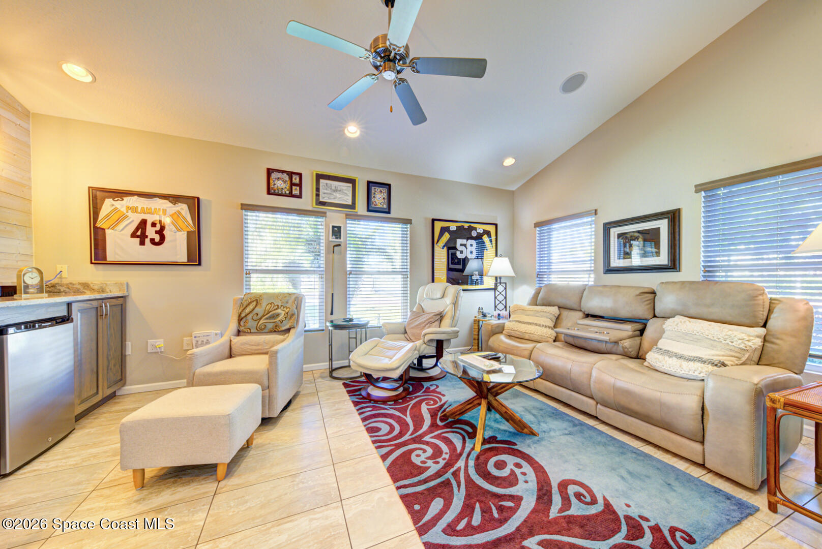 2975 Louetta Circle Melbourne, FL 32901 - Photo 33 of 44 a living room with furniture and a table