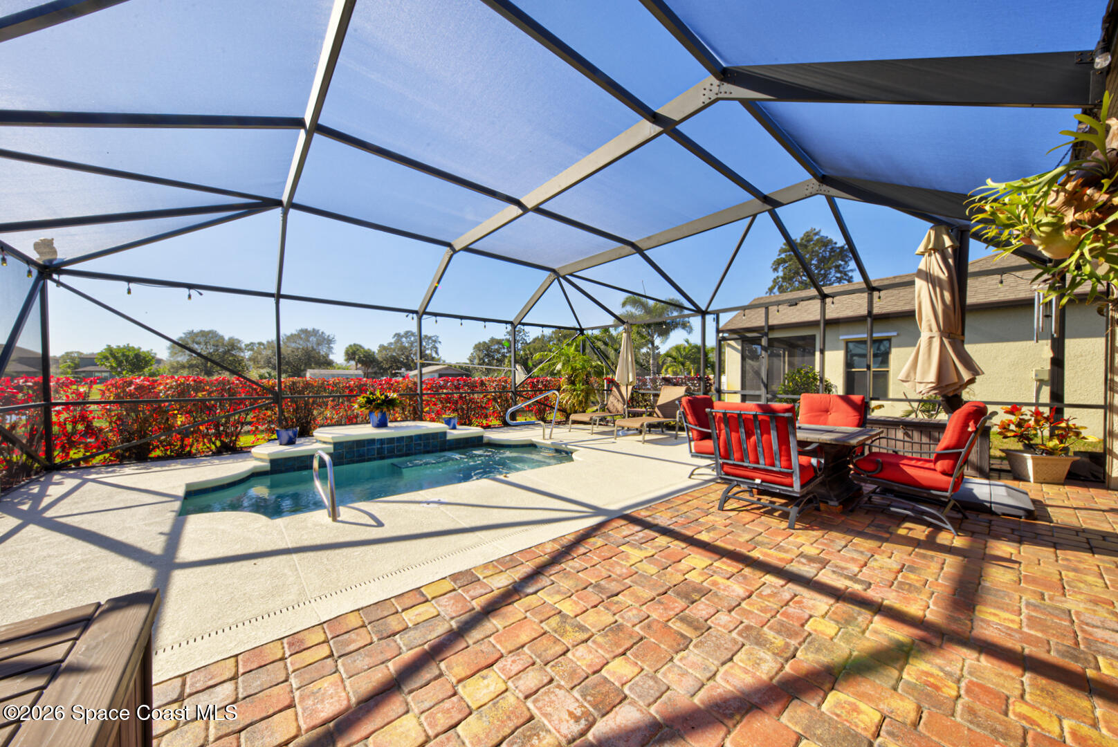 2975 Louetta Circle Melbourne, FL 32901 - Photo 36 of 44 a view of swimming pool with sitting area