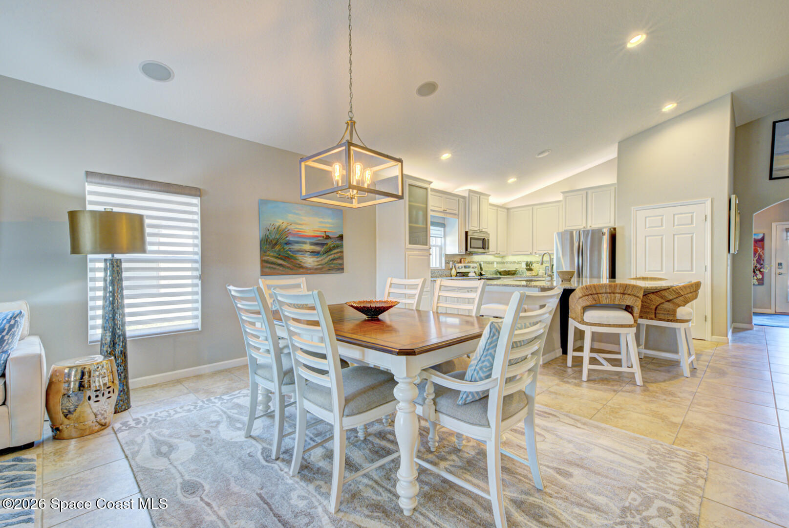 2975 Louetta Circle Melbourne, FL 32901 - Photo 10 of 44 a dining room with furniture and wooden floor