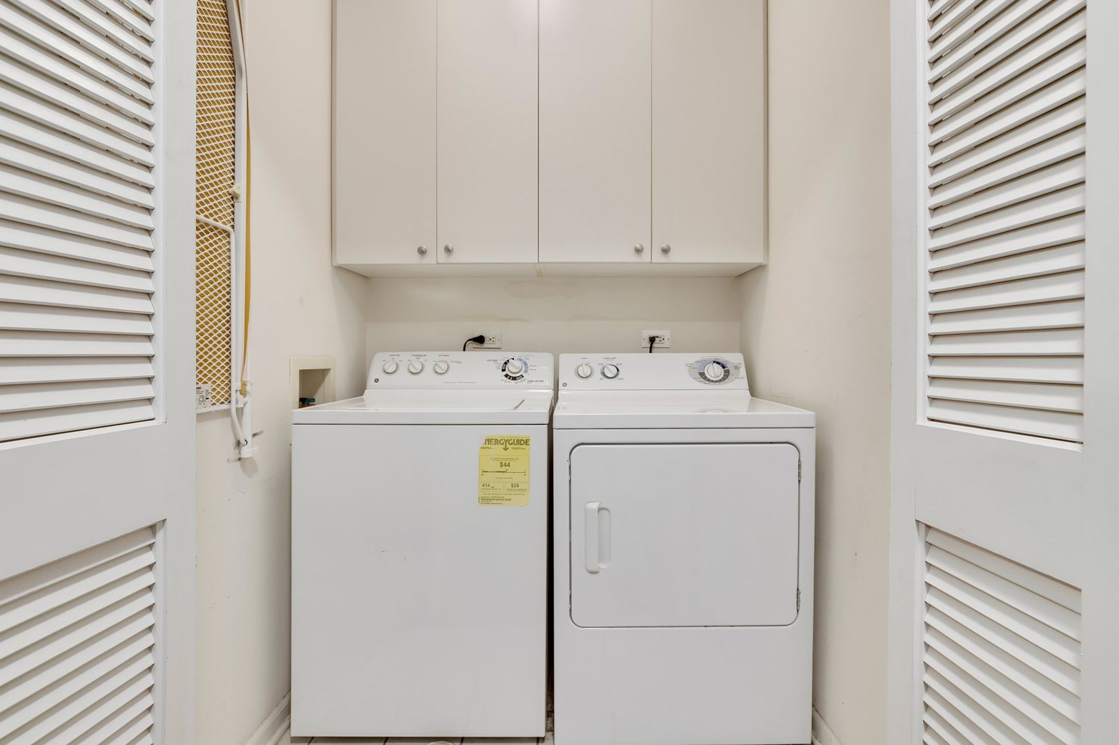 3211 North Racine Avenue, Unit 2 Chicago, IL 60657 - Photo 11 of 22 a utility room with dryer and washer