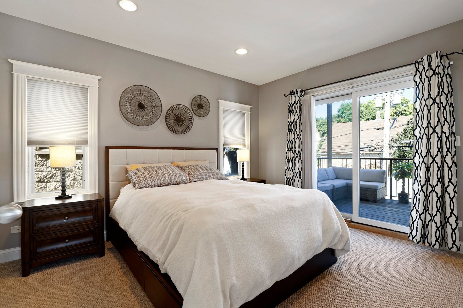 3211 North Racine Avenue, Unit 2 Chicago, IL 60657 - Photo 15 of 22 a bedroom with a bed and a large window