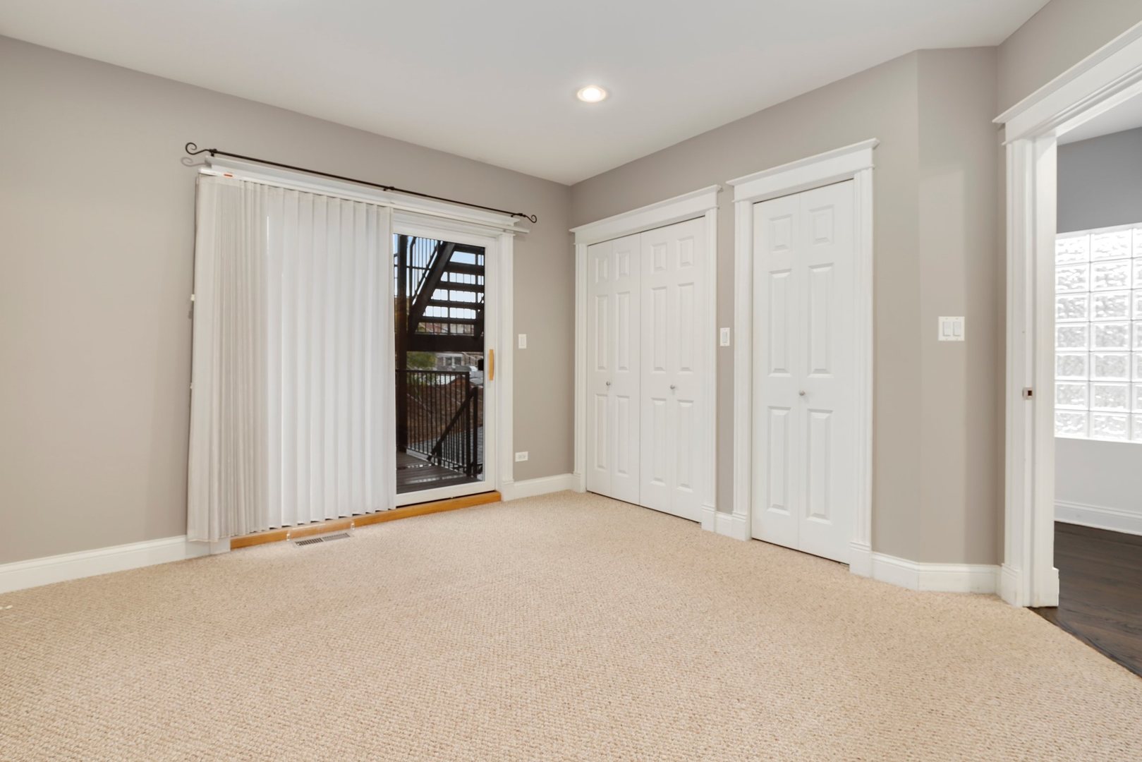 3211 North Racine Avenue, Unit 2 Chicago, IL 60657 - Photo 17 of 22 an empty room with closet and a window