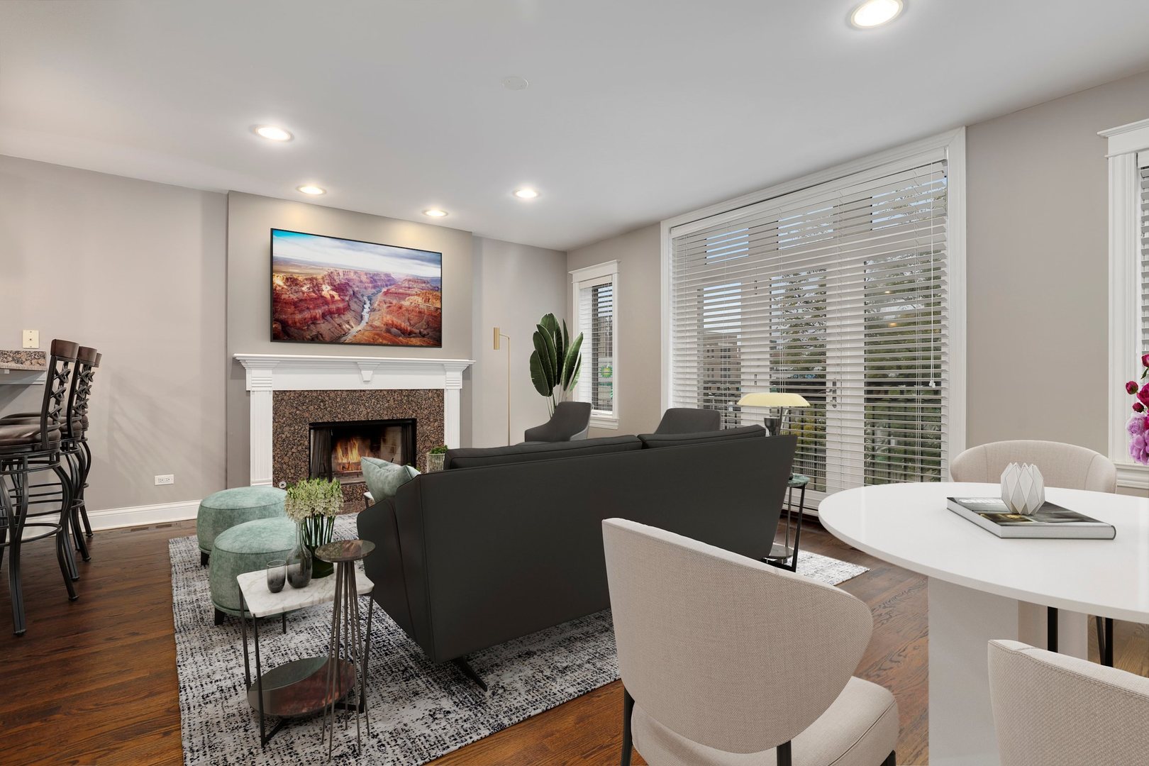 3211 North Racine Avenue, Unit 2 Chicago, IL 60657 - Photo 2 of 22 a living room with furniture a table and a fireplace