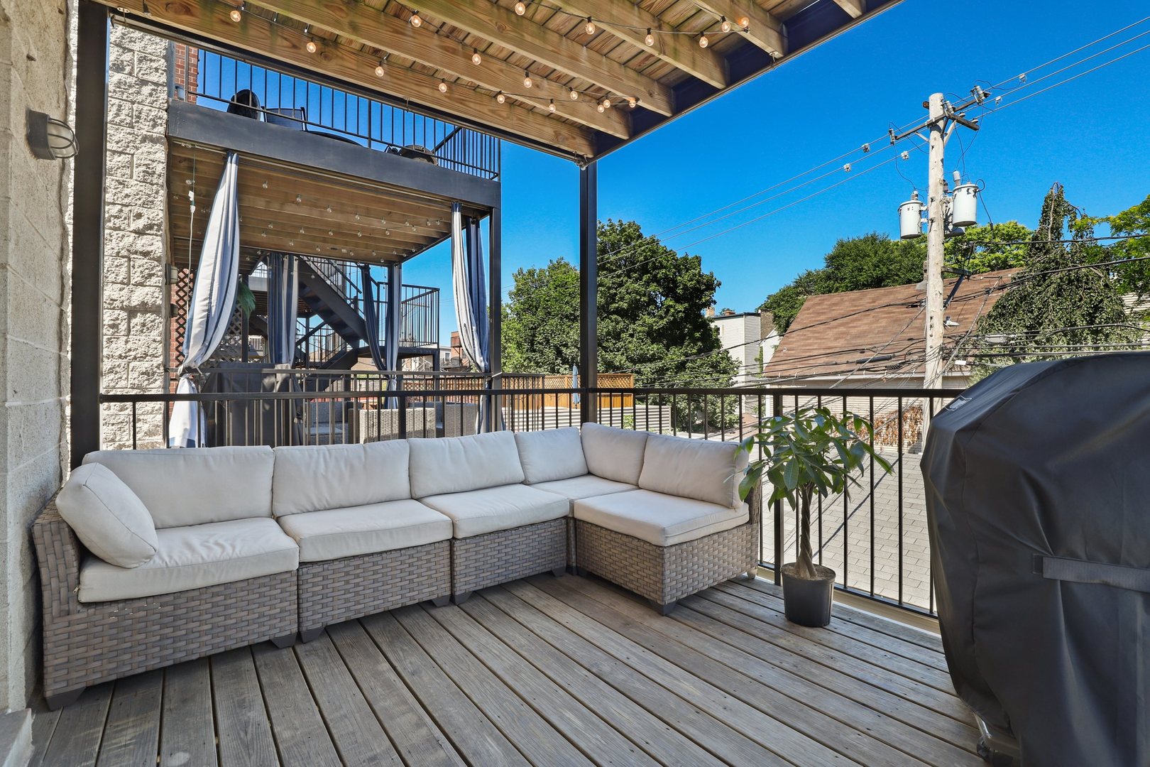 3211 North Racine Avenue, Unit 2 Chicago, IL 60657 - Photo 21 of 22 a view of a couches on the roof deck