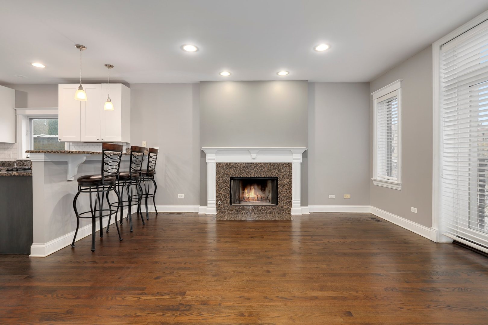 3211 North Racine Avenue, Unit 2 Chicago, IL 60657 - Photo 5 of 22 a view of dining room with furniture and wooden floor