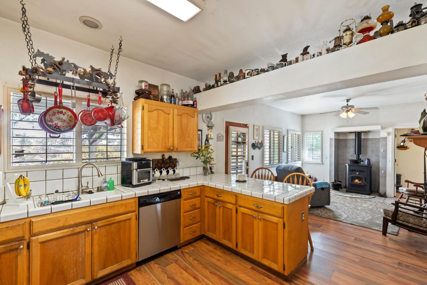 35670 Road 603 Raymond, CA 93653 - Photo 27 of 61 a large kitchen with stainless steel appliances lots of counter space and a sink