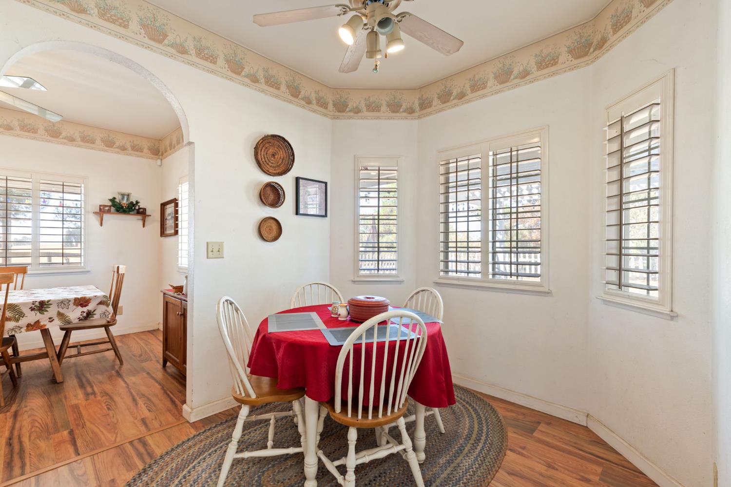 35670 Road 603 Raymond, CA 93653 - Photo 28 of 61 a view of a dining room with furniture and wooden floor