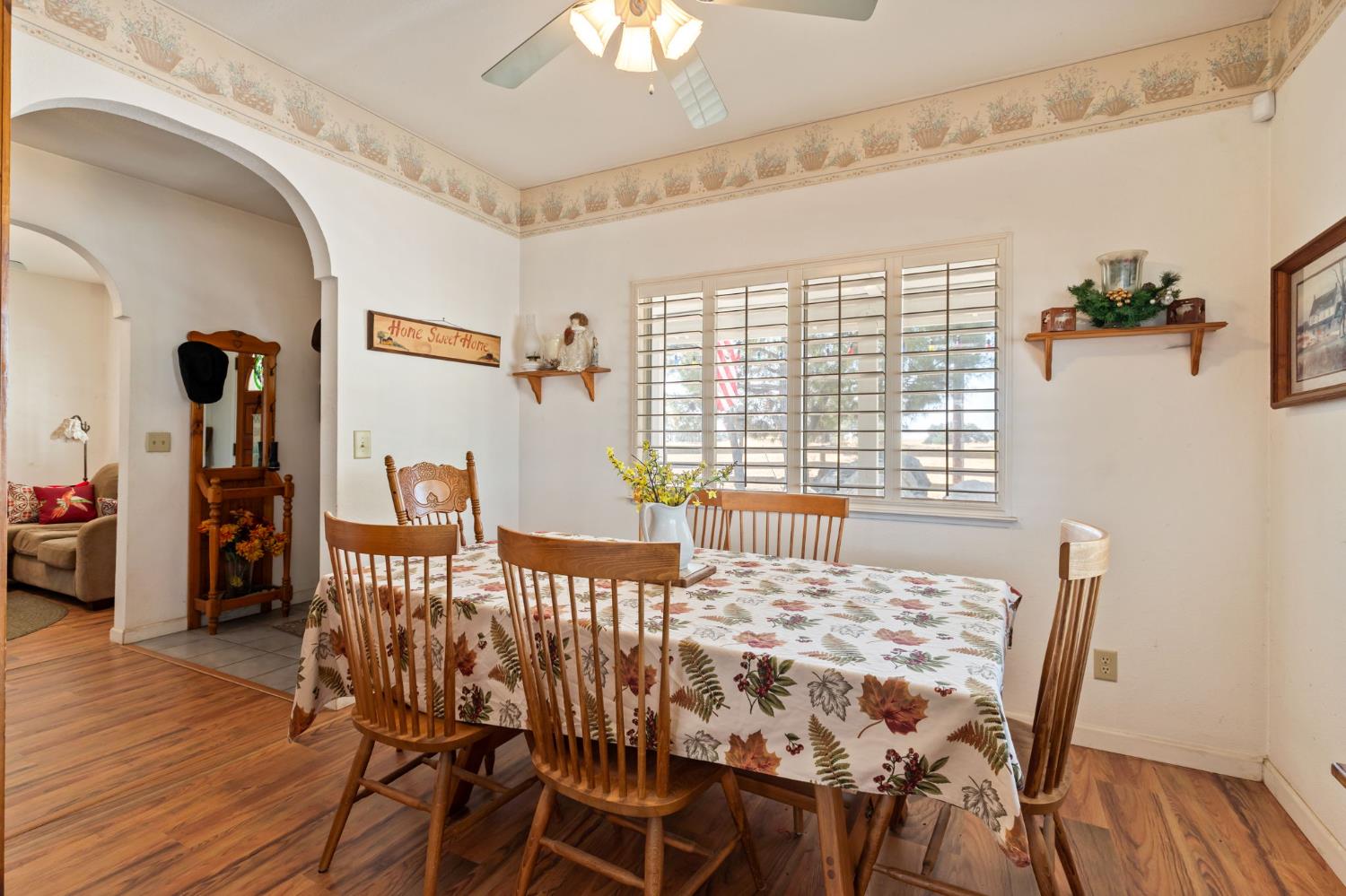 35670 Road 603 Raymond, CA 93653 - Photo 30 of 61 a view of a dining room with furniture and wooden floor