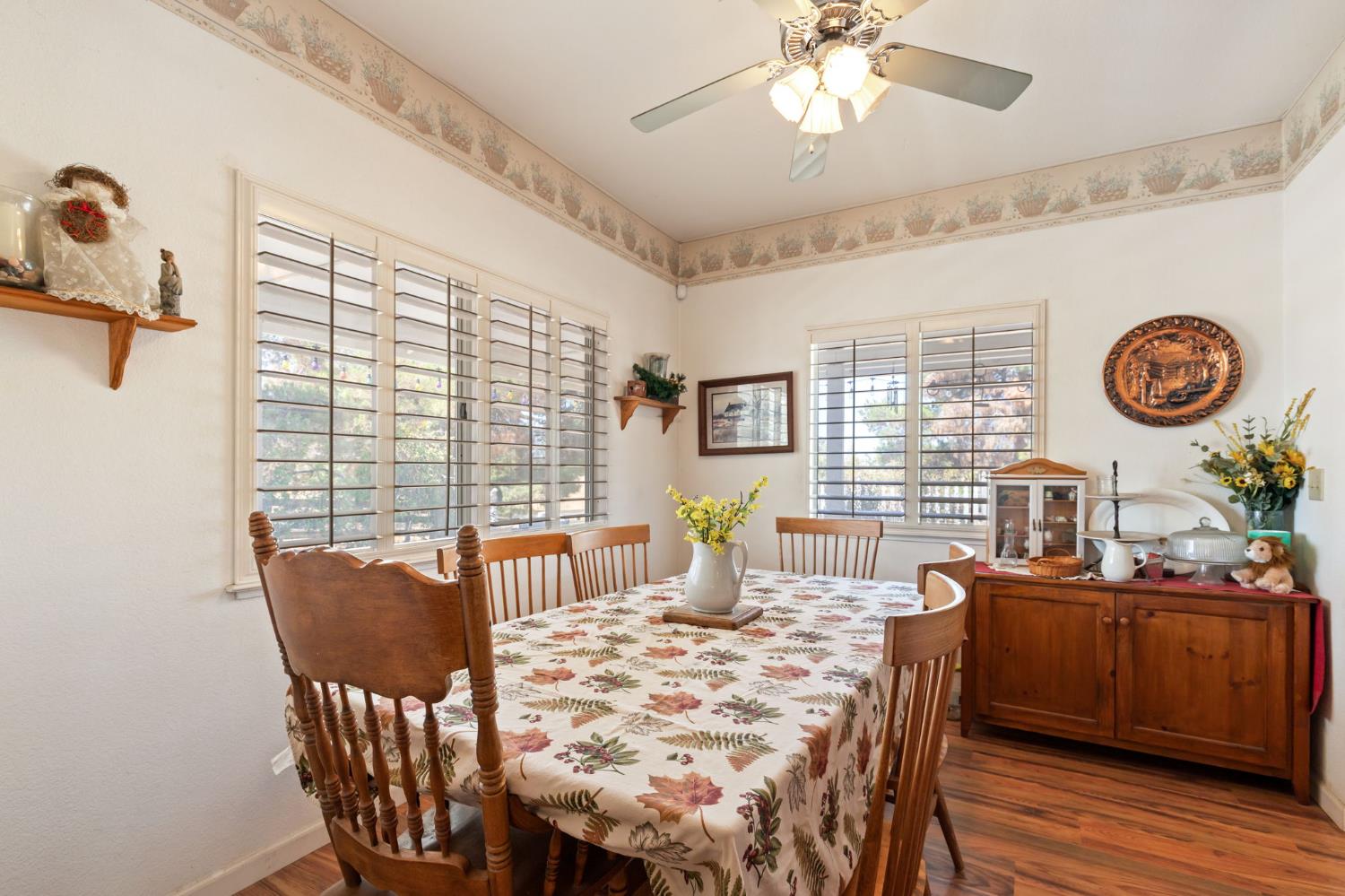 35670 Road 603 Raymond, CA 93653 - Photo 31 of 61 a view of a dining room with furniture window and wooden floor