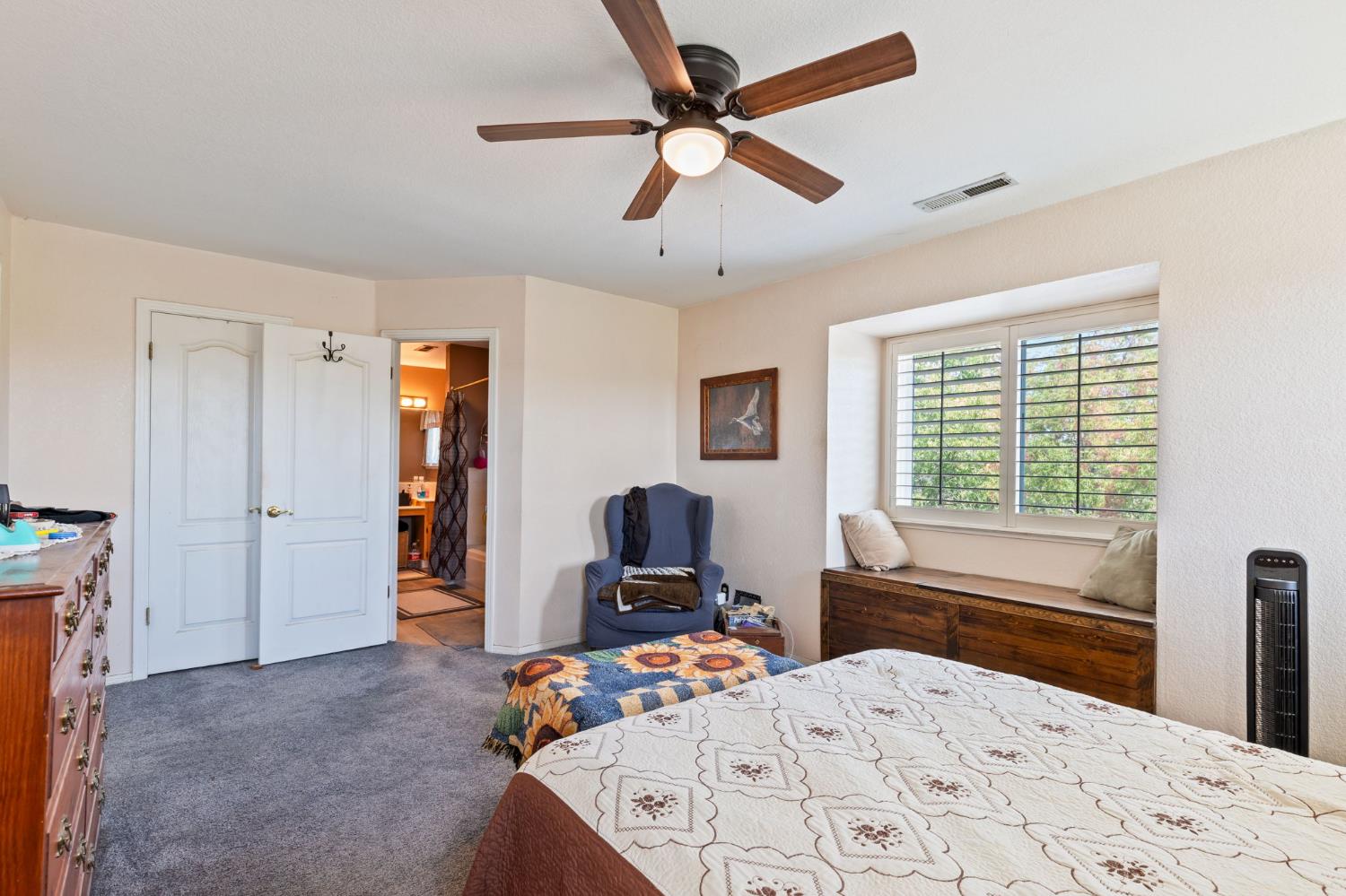 35670 Road 603 Raymond, CA 93653 - Photo 38 of 61 a bedroom with a bed and wooden floor