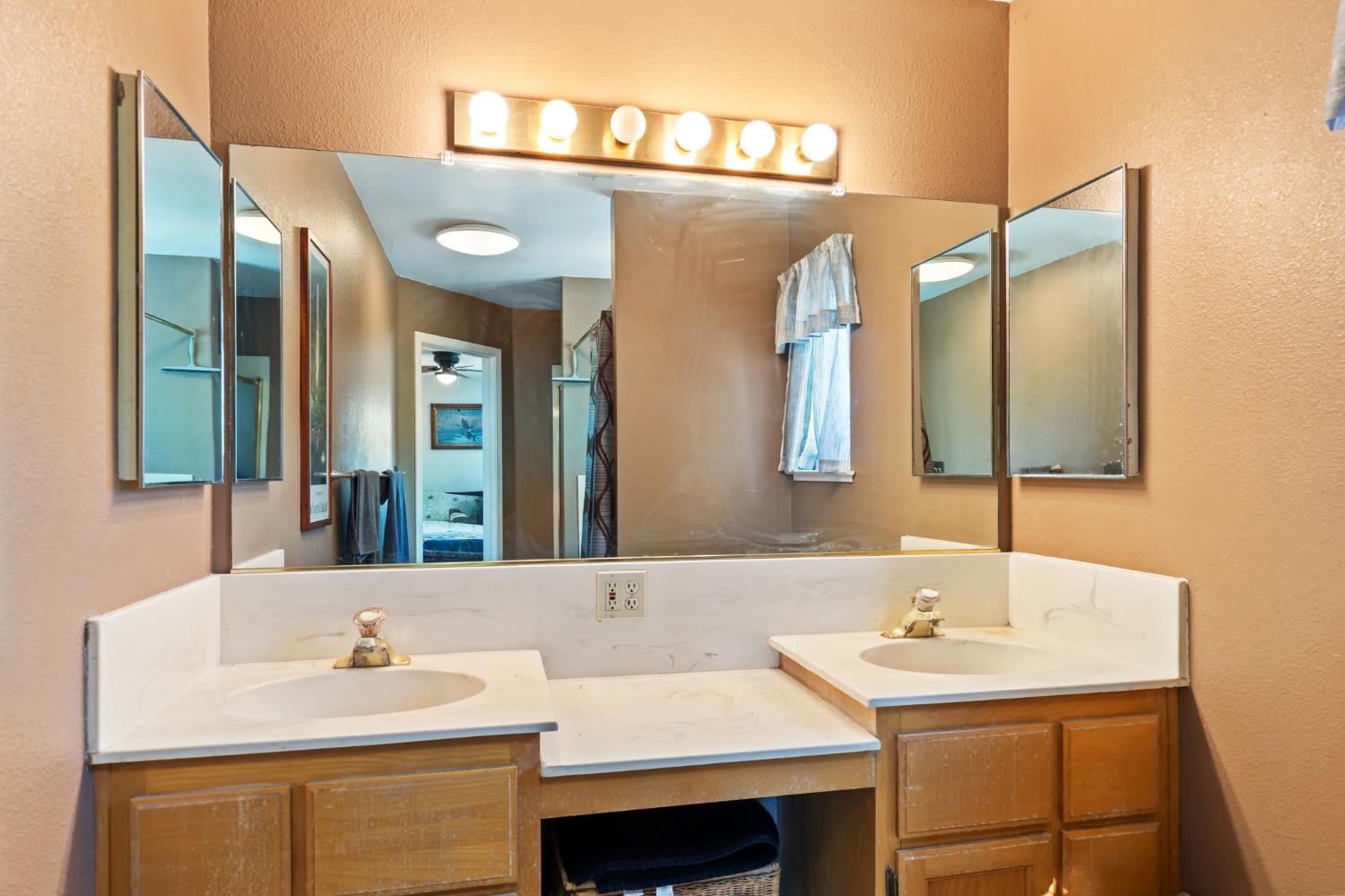 35670 Road 603 Raymond, CA 93653 - Photo 40 of 61 a bathroom with a sink and a mirror