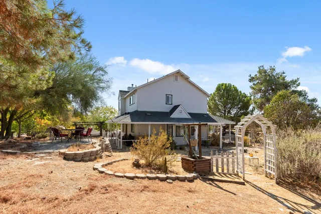 a front view of a house with a patio