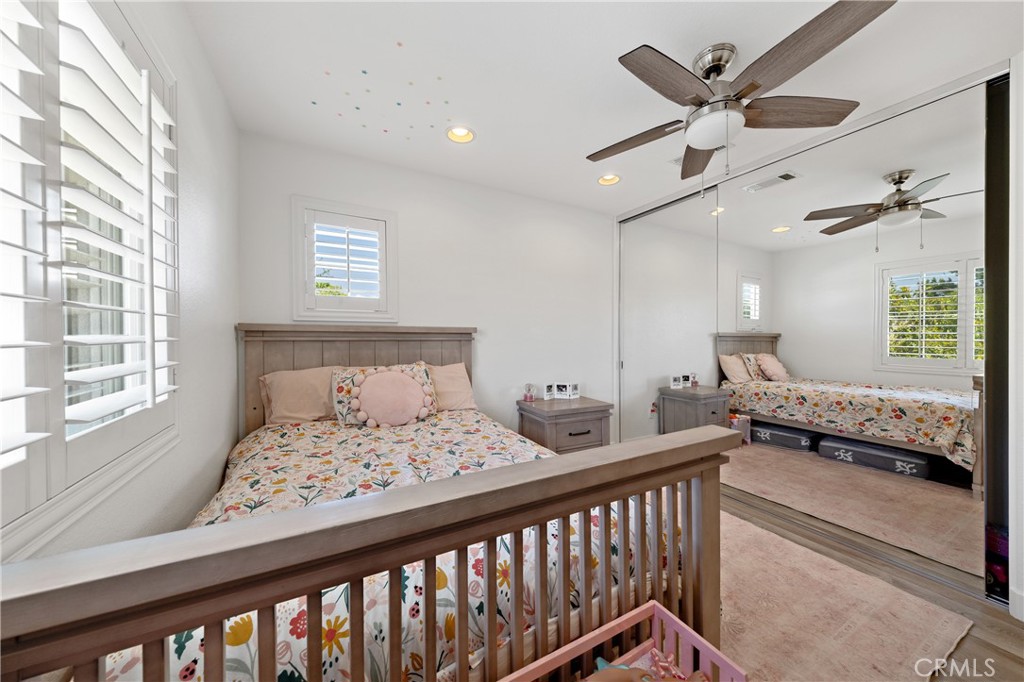 32985 Novara Court Temecula, CA 92592 - Photo 36 of 56 Bright And Cheerful Bedroom With Ceiling Fan And Plantation Shutters