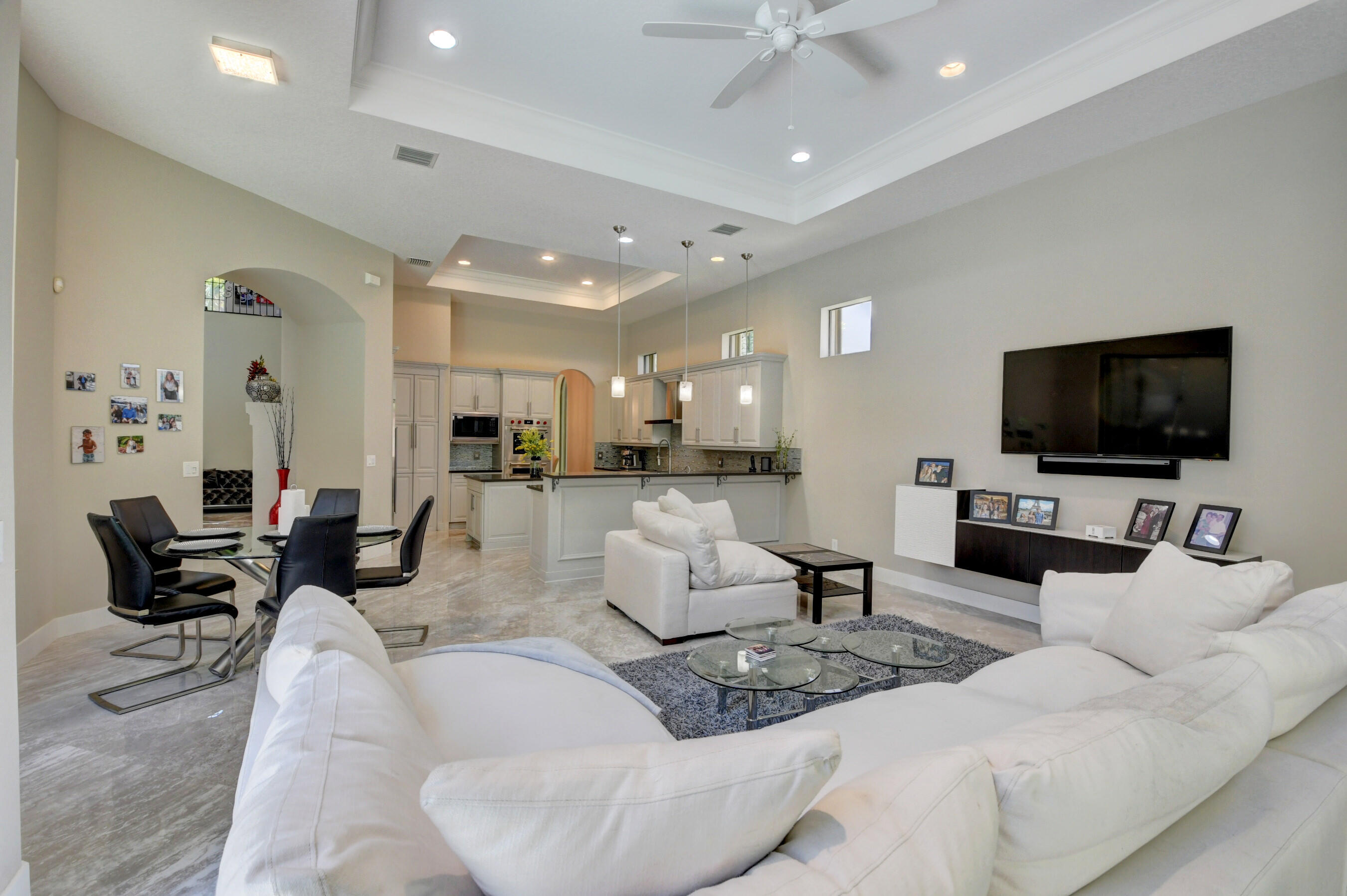 17798 Cadena Drive Boca Raton, FL 33496 - Photo 11 of 49 a living room with furniture and a flat screen tv