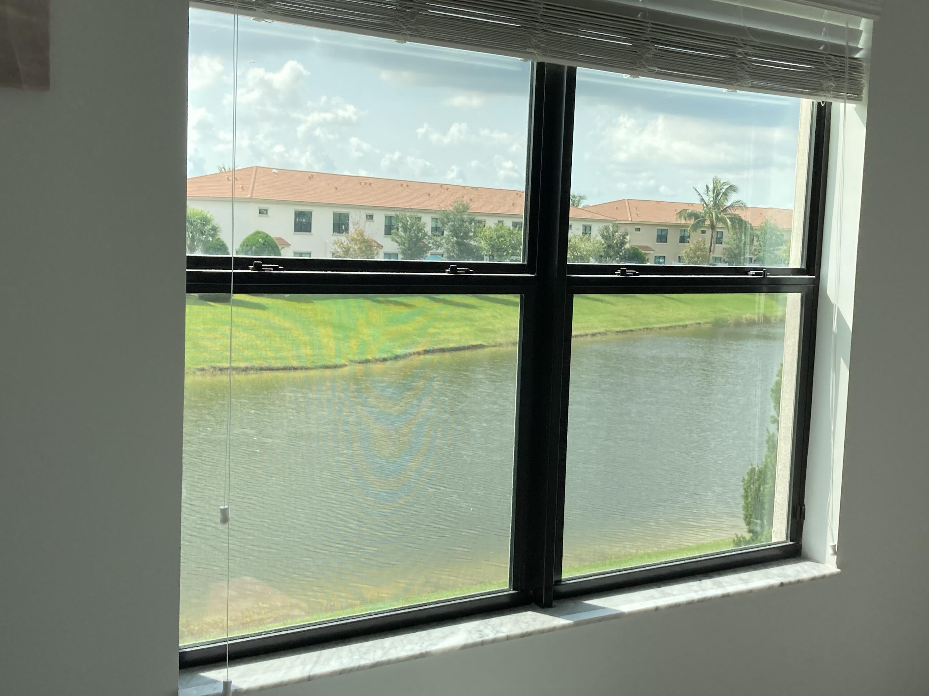 10092 Brickhill Drive Boca Raton, FL 33428 - Photo 14 of 42 a view of a glass door