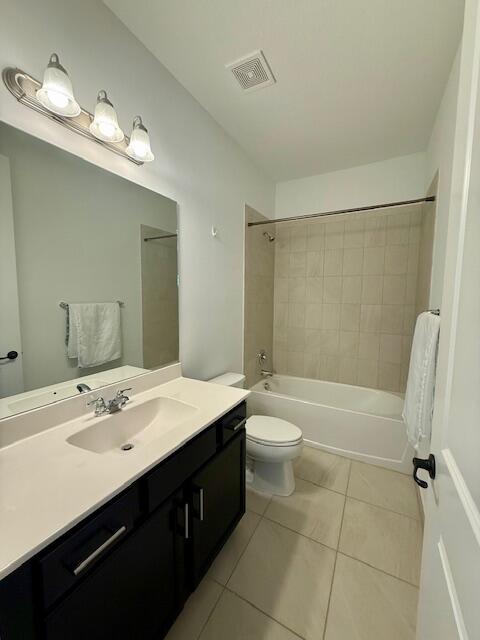 10092 Brickhill Drive Boca Raton, FL 33428 - Photo 21 of 42 a bathroom with a sink a toilet a mirror and shower