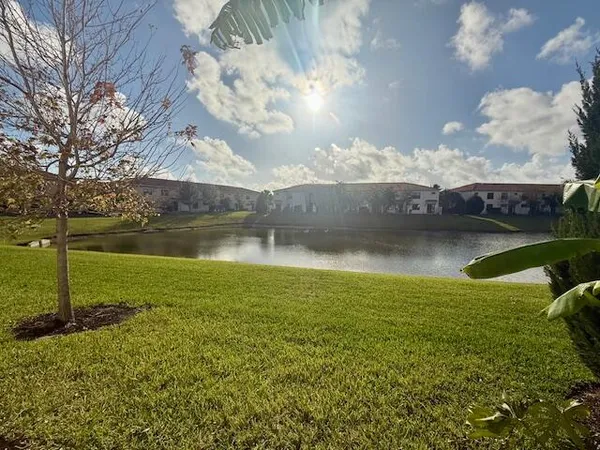 a view of a lake from a yard